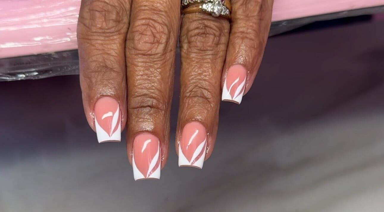 Chic pink and white nail design at SM Beauty Bar & Spa, Maynards, Saint Peter, BB.