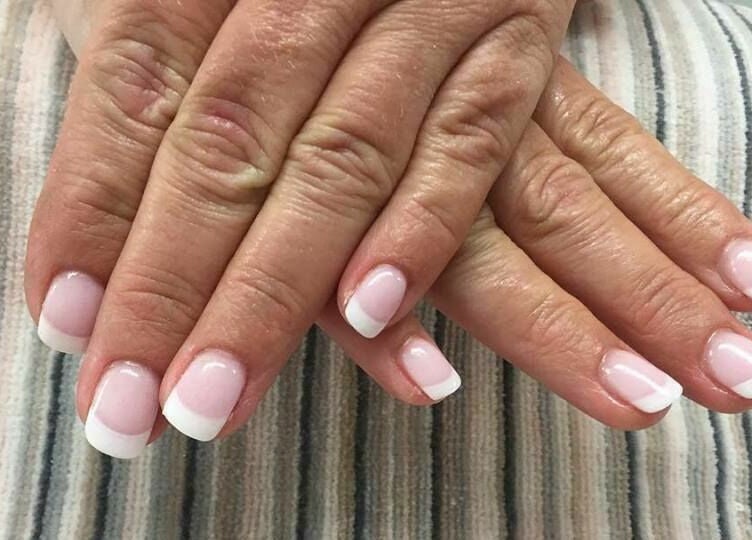 French manicure at The Lash Gallery, Knaresborough, England, GB, showcasing elegant natural nail design.