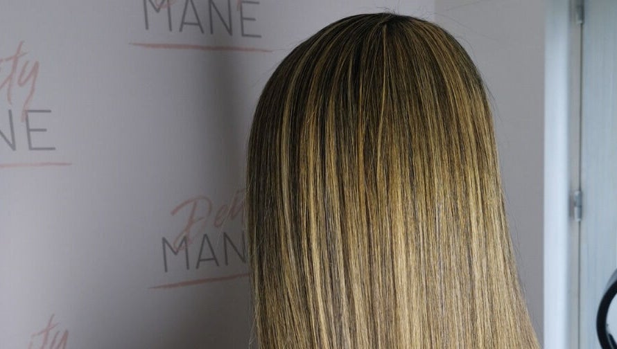 Sleek, highlighted hair showcased at DeityMANE Salon space, London, England, GB.