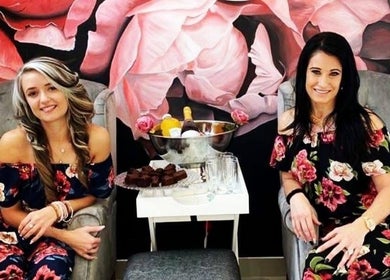 Guests enjoy a stylish setting with floral decor at Face & Body Studio SA, Boksburg, Gauteng, ZA.