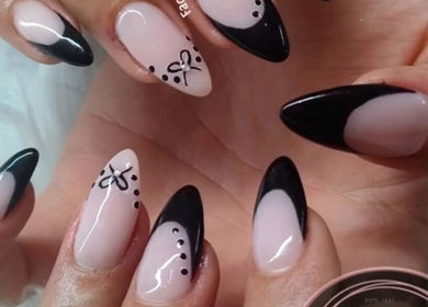 Elegant manicure with black tips at Face & Body Studio SA, Boksburg, Gauteng, ZA.