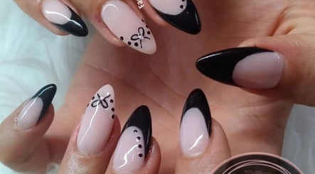 Elegant manicure with black tips at Face & Body Studio SA, Boksburg, Gauteng, ZA.