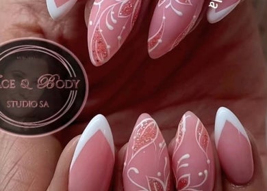 Close-up of elegant pink nail art at Face & Body Studio SA, Boksburg, Gauteng, ZA.