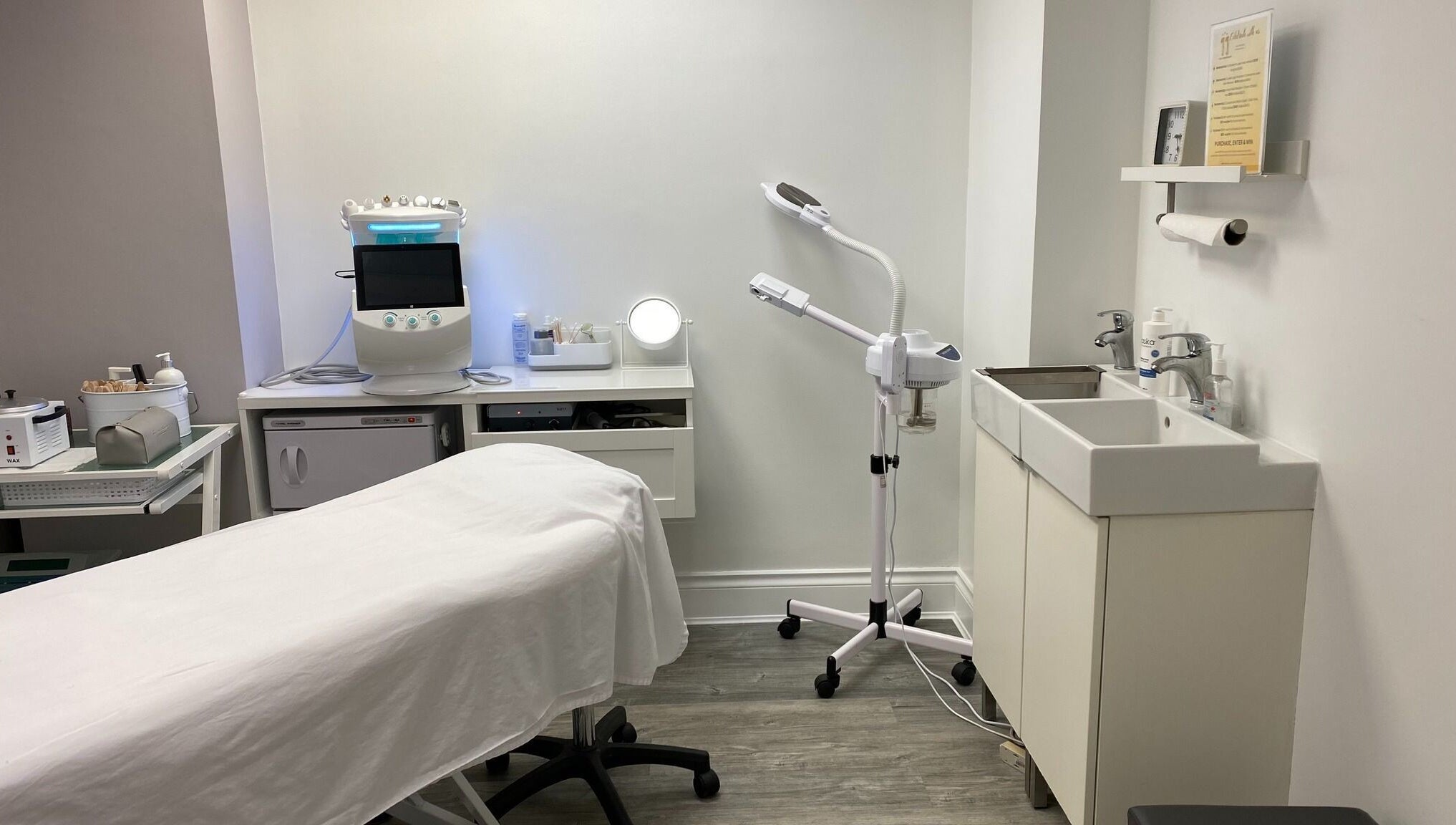 Professional treatment room at Voka Deka Esthetics Salon, Vancouver, BC, CA, featuring modern equipment.