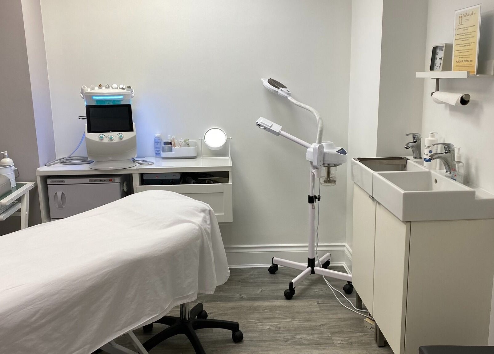 Professional treatment room at Voka Deka Esthetics Salon, Vancouver, BC, CA, featuring modern equipment.