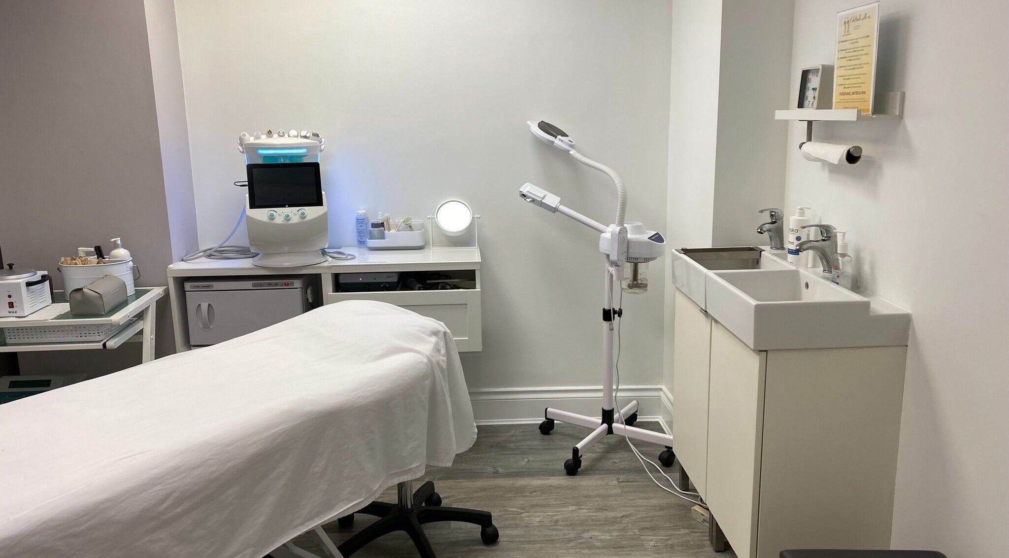 Professional treatment room at Voka Deka Esthetics Salon, Vancouver, BC, CA, featuring modern equipment.