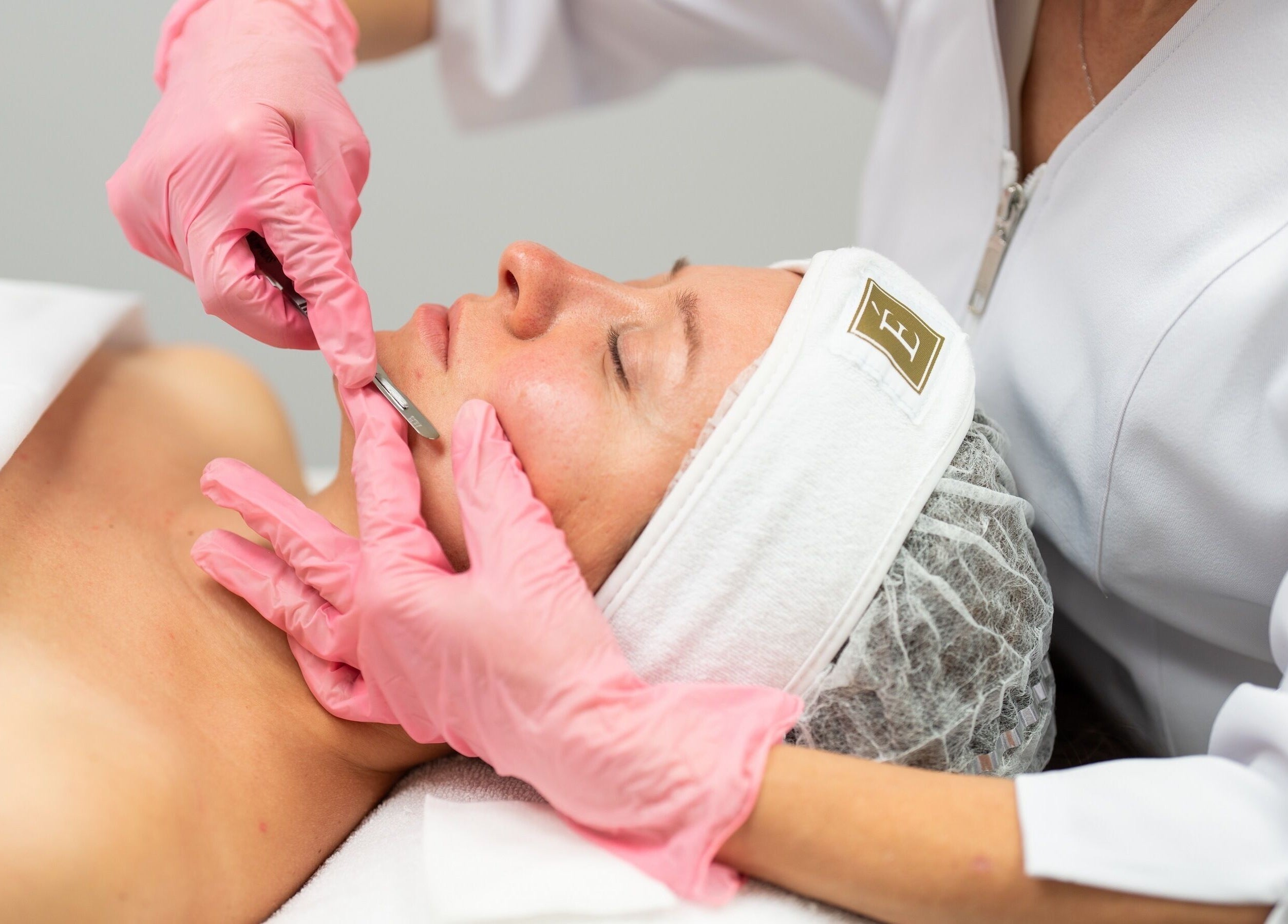 Facial treatment at Voka Deka Esthetics Salon in Vancouver, British Columbia, CA with precision tool.