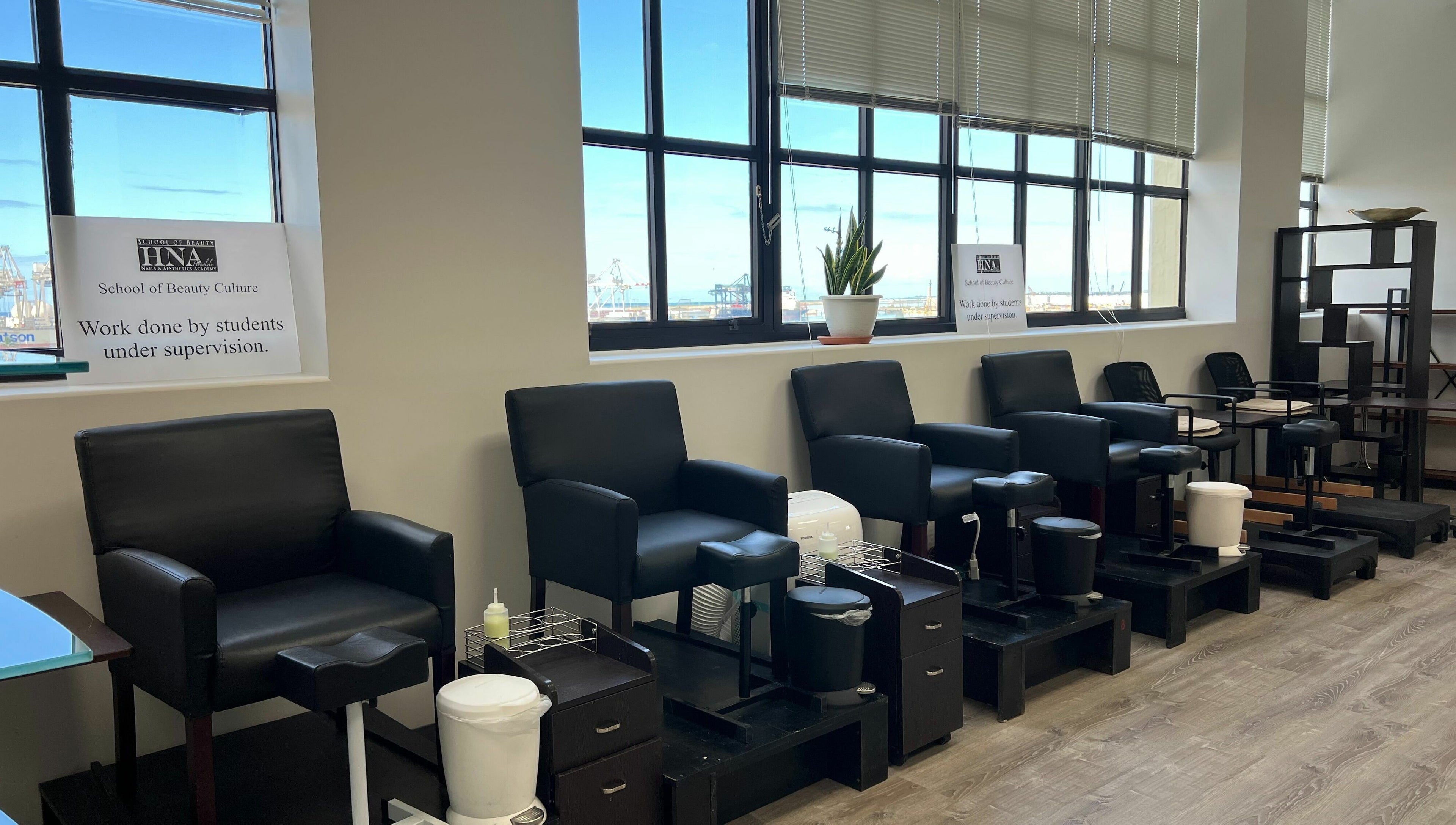 Modern pedicure chairs at Honolulu Nails & Aesthetics Academy, Honolulu, Hawaii, US, ready for treatments.