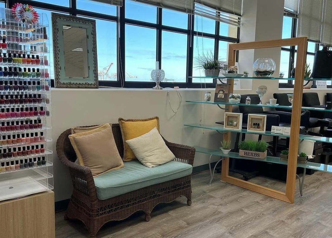 Cozy lounge area at Honolulu Nails & Aesthetics Academy, featuring colorful polishes in Honolulu, Hawaii, US.