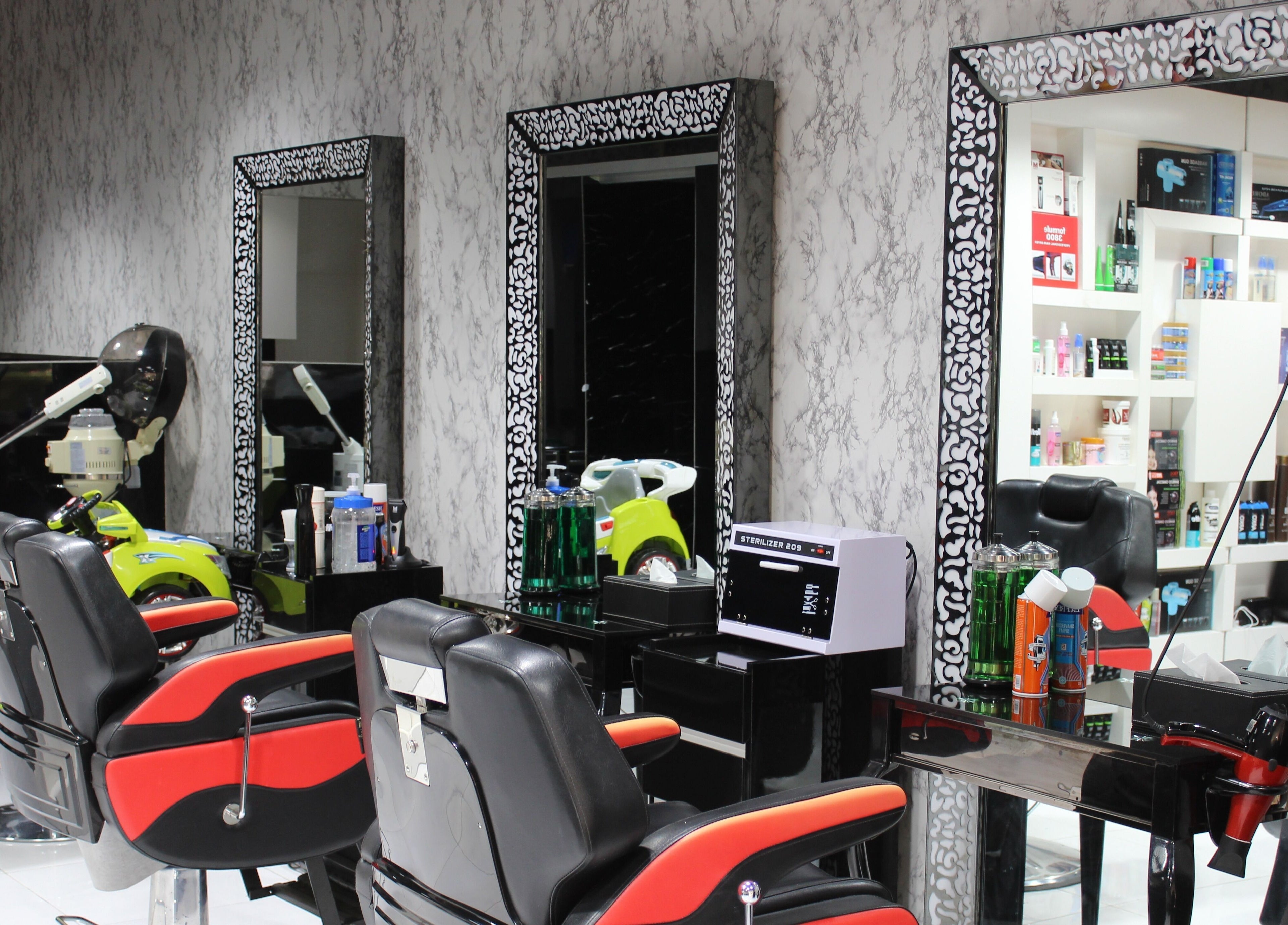 Chic barber stations at Cutting Edge Gents Salon | Cluster P in Dubai, AE, showcasing a modern, elegant design.