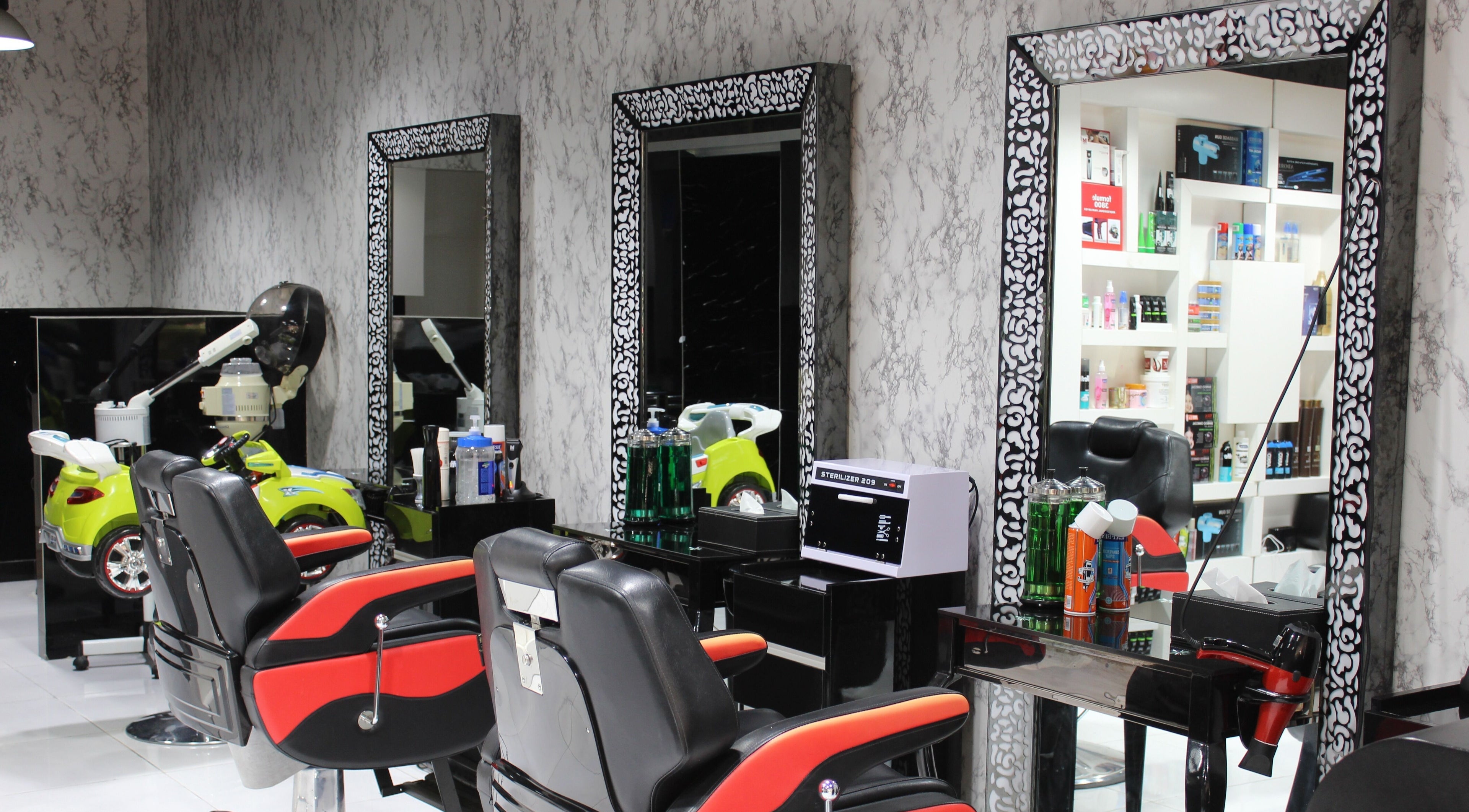 Chic barber stations at Cutting Edge Gents Salon | Cluster P in Dubai, AE, showcasing a modern, elegant design.