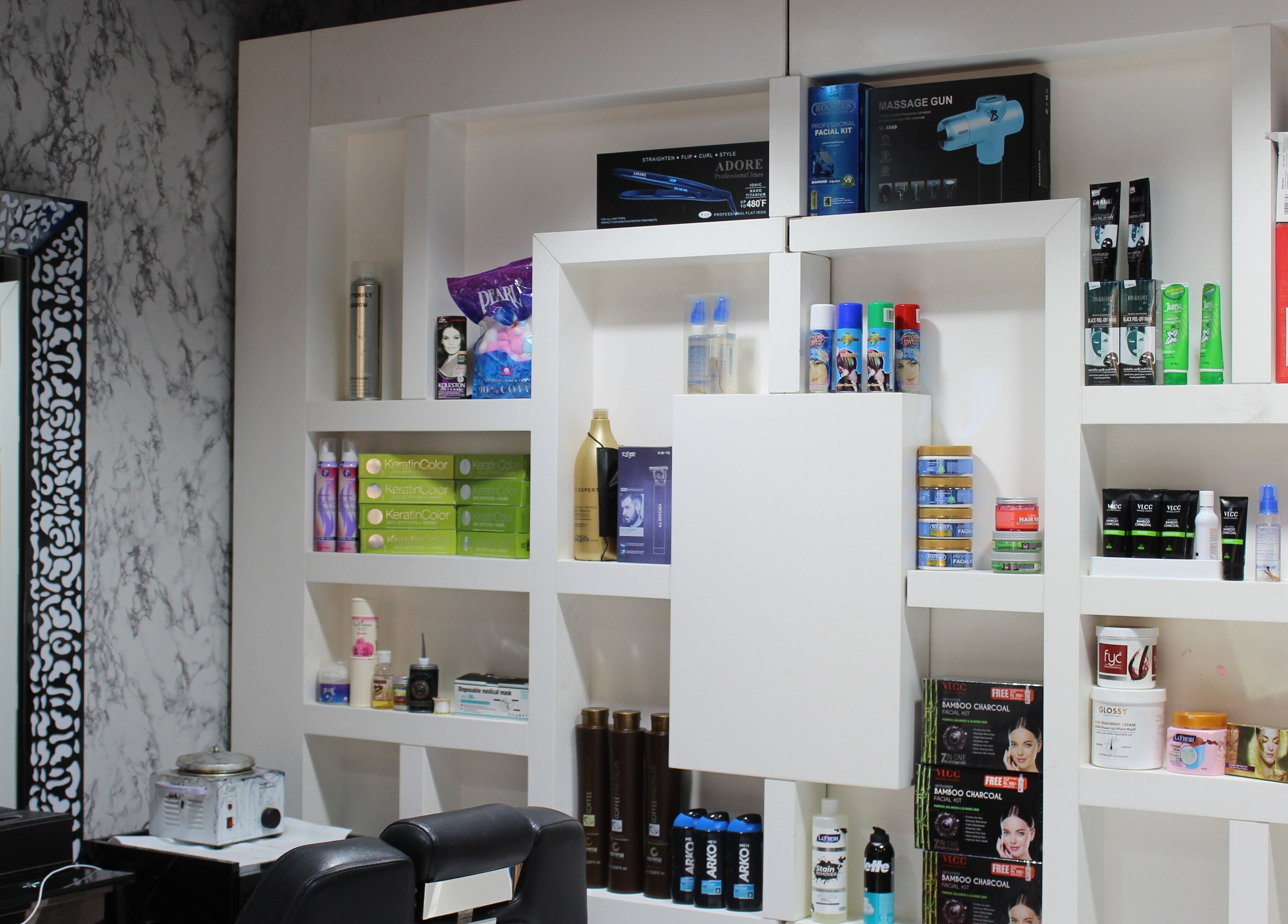 Product shelves at Cutting Edge Gents Salon in Cluster P, Dubai, AE showcasing grooming essentials.