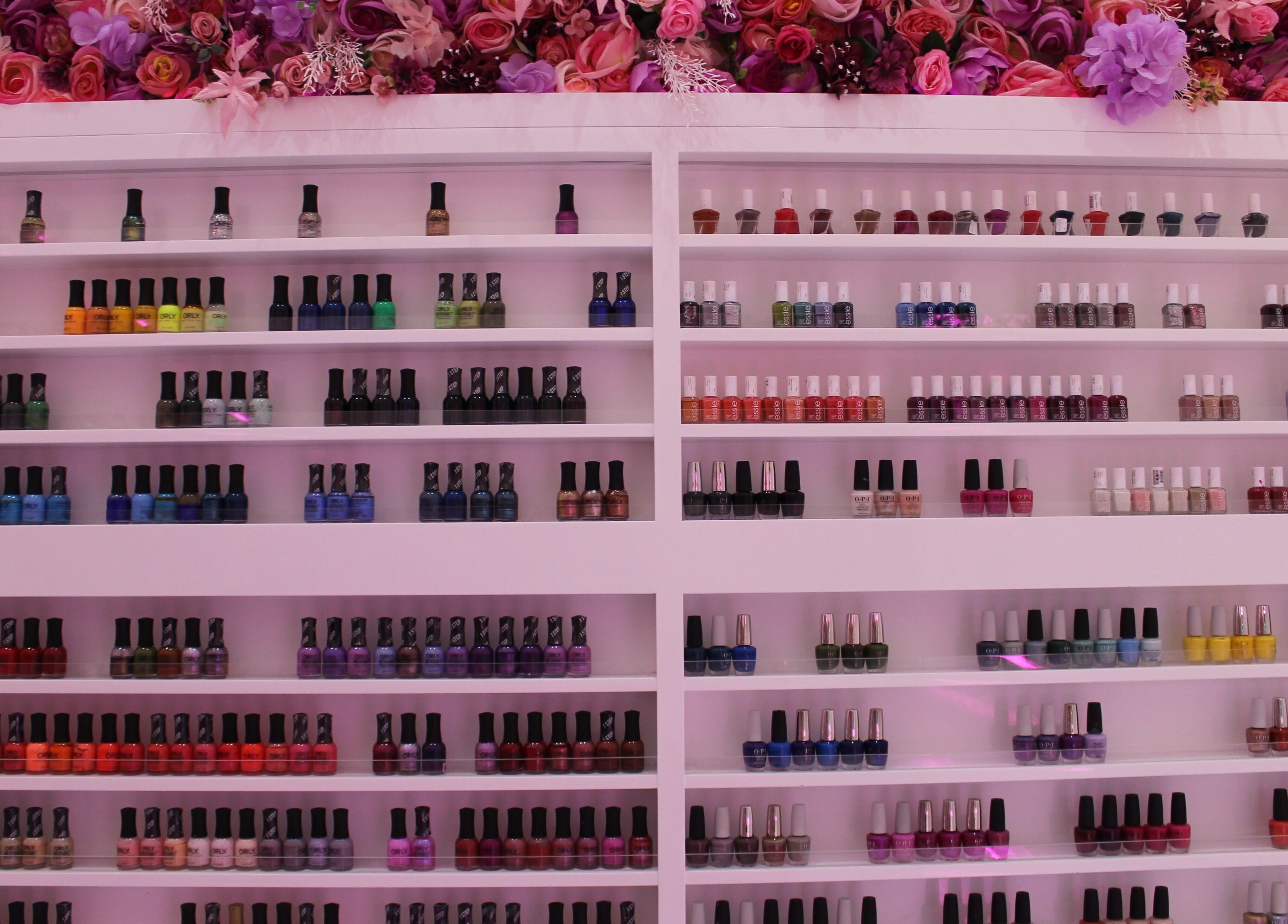 Colorful nail polish display at Cutting Edge Salon & SPA | Silicon Central Mall, Dubai, Dubai, AE.