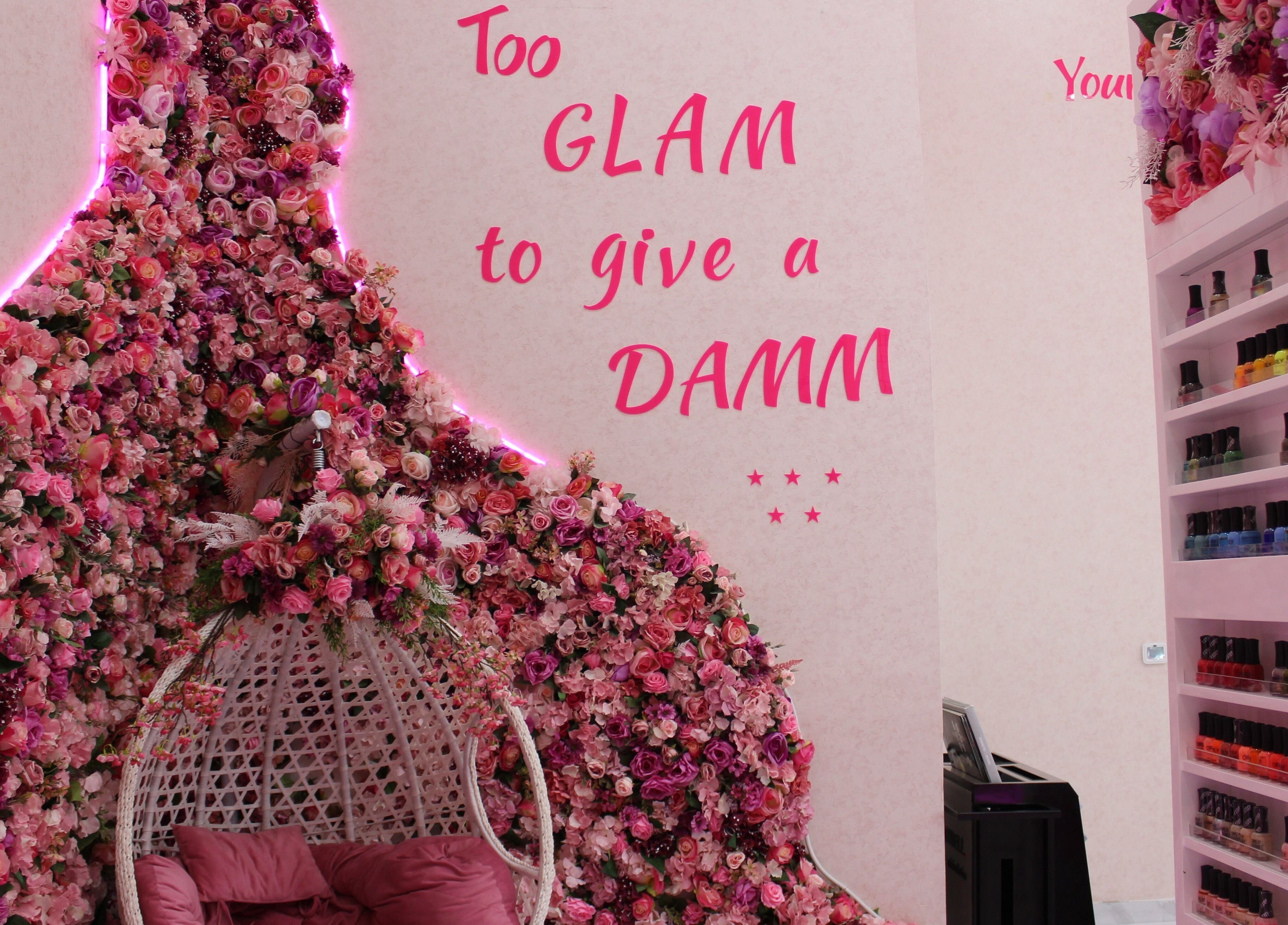 Luxurious flower wall and nail polish display at Cutting Edge Salon & SPA | Silicon Central Mall, Dubai, Dubai, AE.