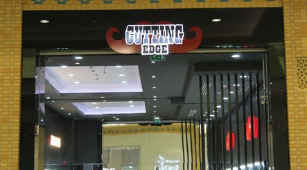 Entrance of Cutting Edge Gents Salon | IBN Battuta Mall, Dubai, AE, showcasing modern interiors.