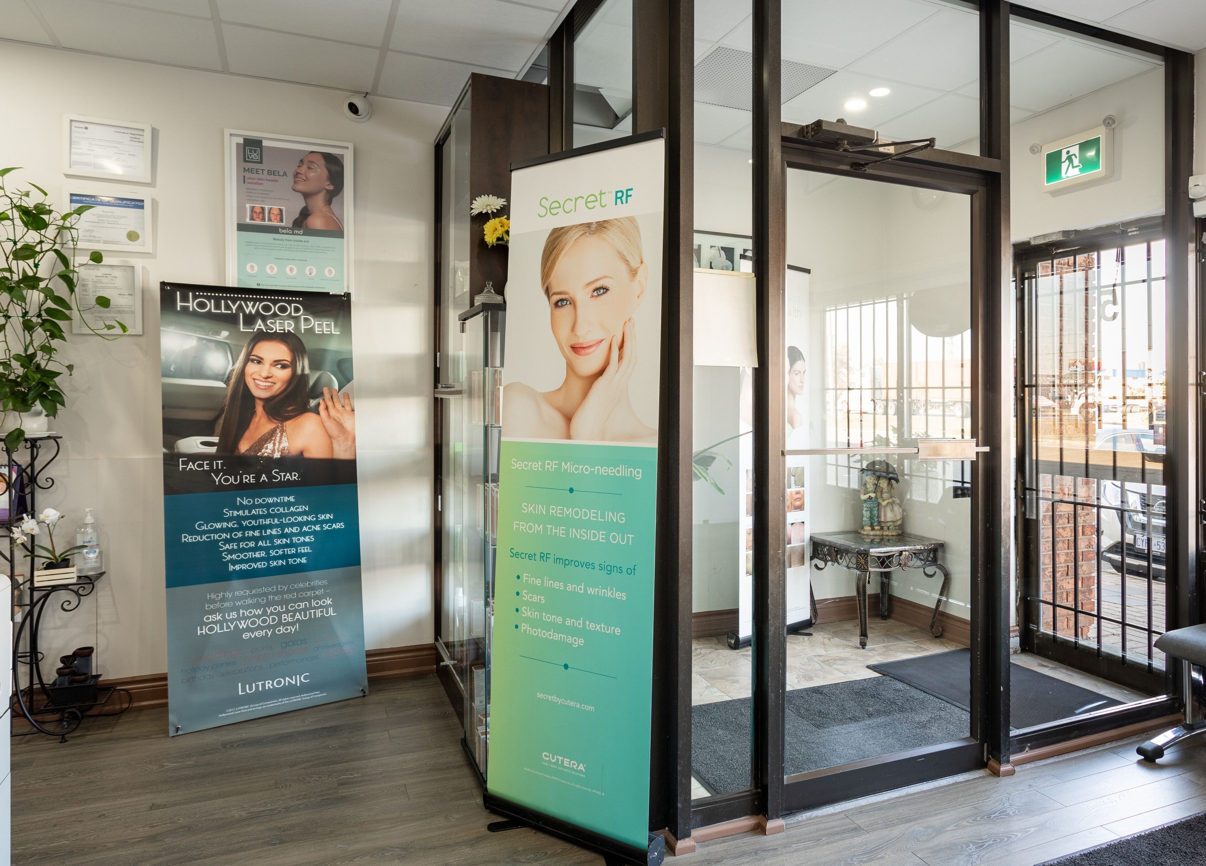 Entrance of PLC Laser Clinic in Brampton, Ontario, CA, featuring promotional wellness banners.