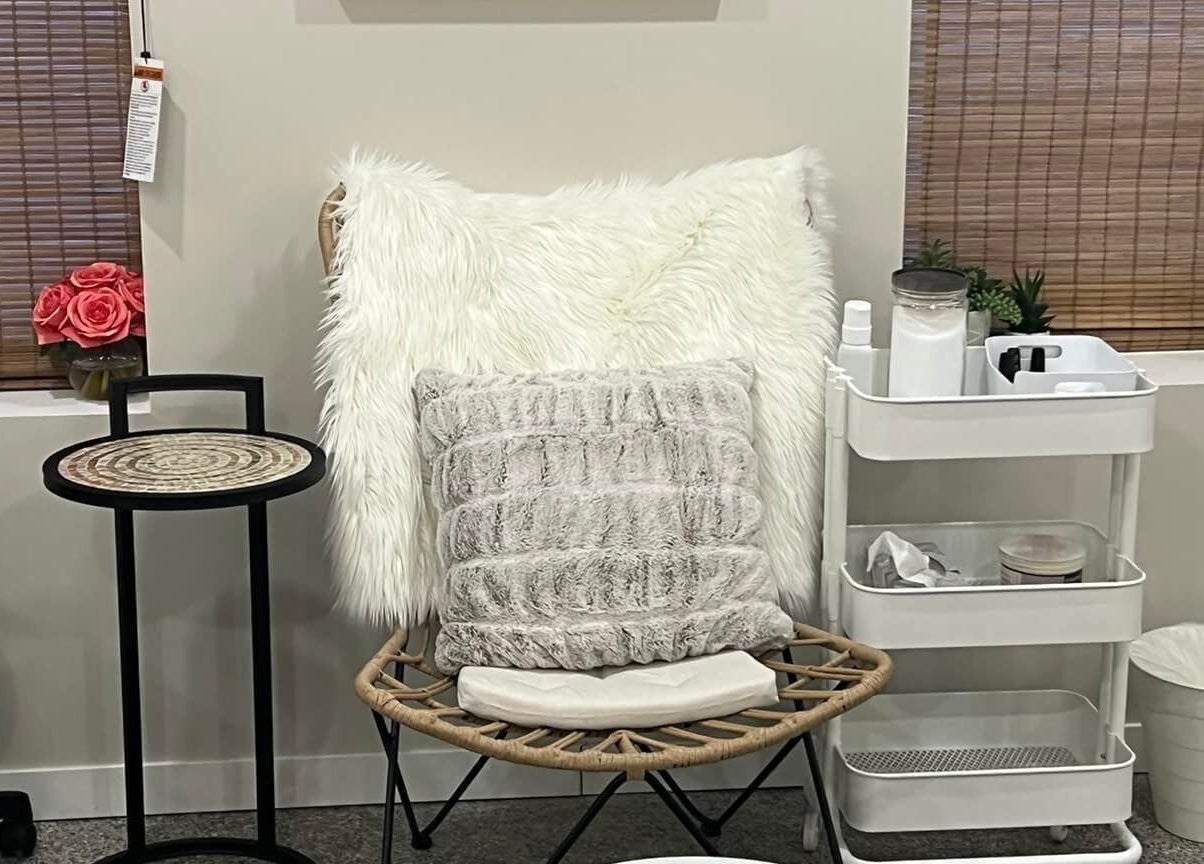 Welcoming chair with plush pillows at Clover Therapeutic Wellness Centre, Niagara Falls, Ontario, CA.