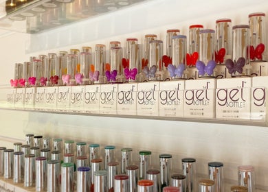 Diverse nail polish bottles at Hive Nails & Beauty, Silkstone, England, GB, showcasing vibrant shades.