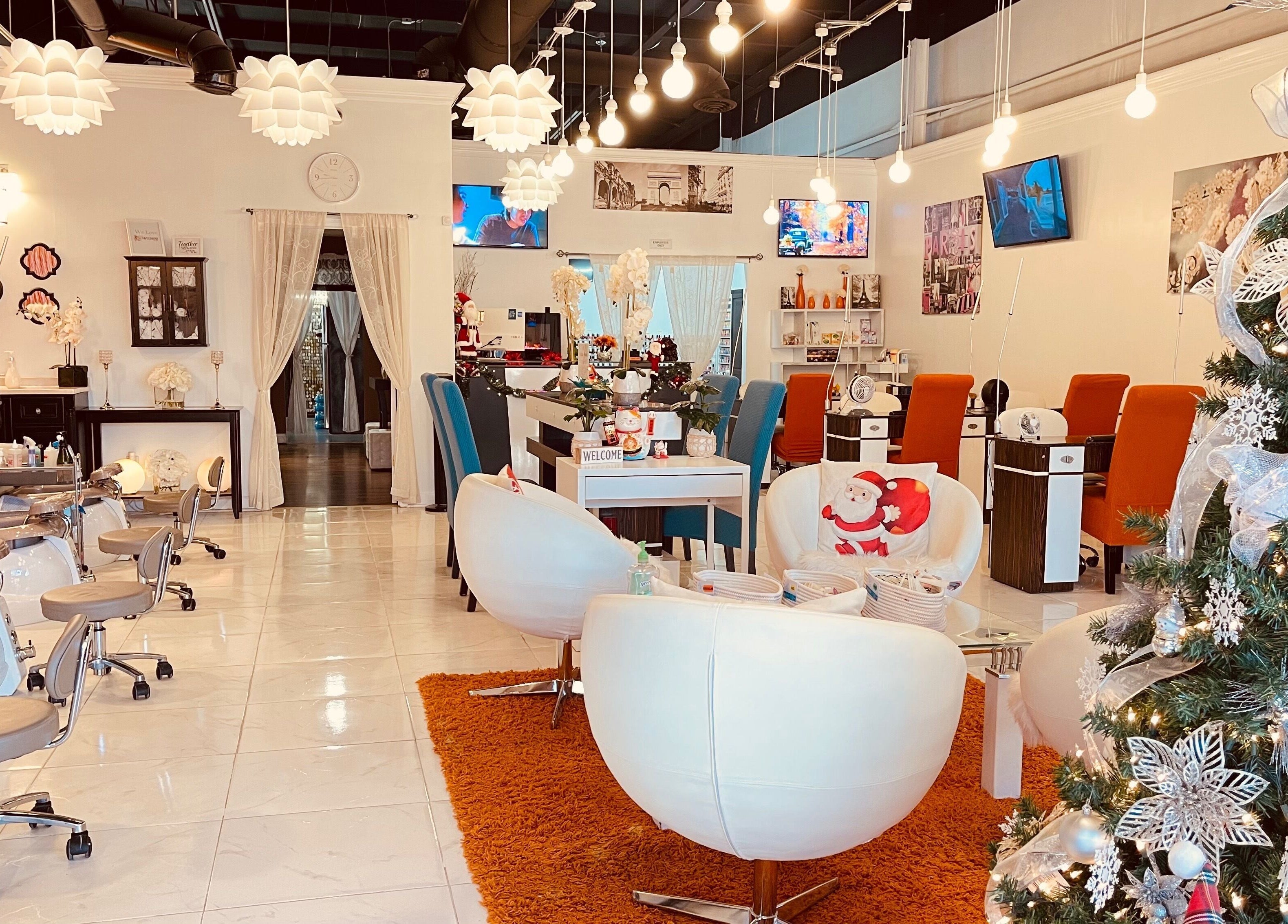 Festive salon interior at Together Nail Parlor, Suwanee, Georgia, US with elegant chairs and decorations.