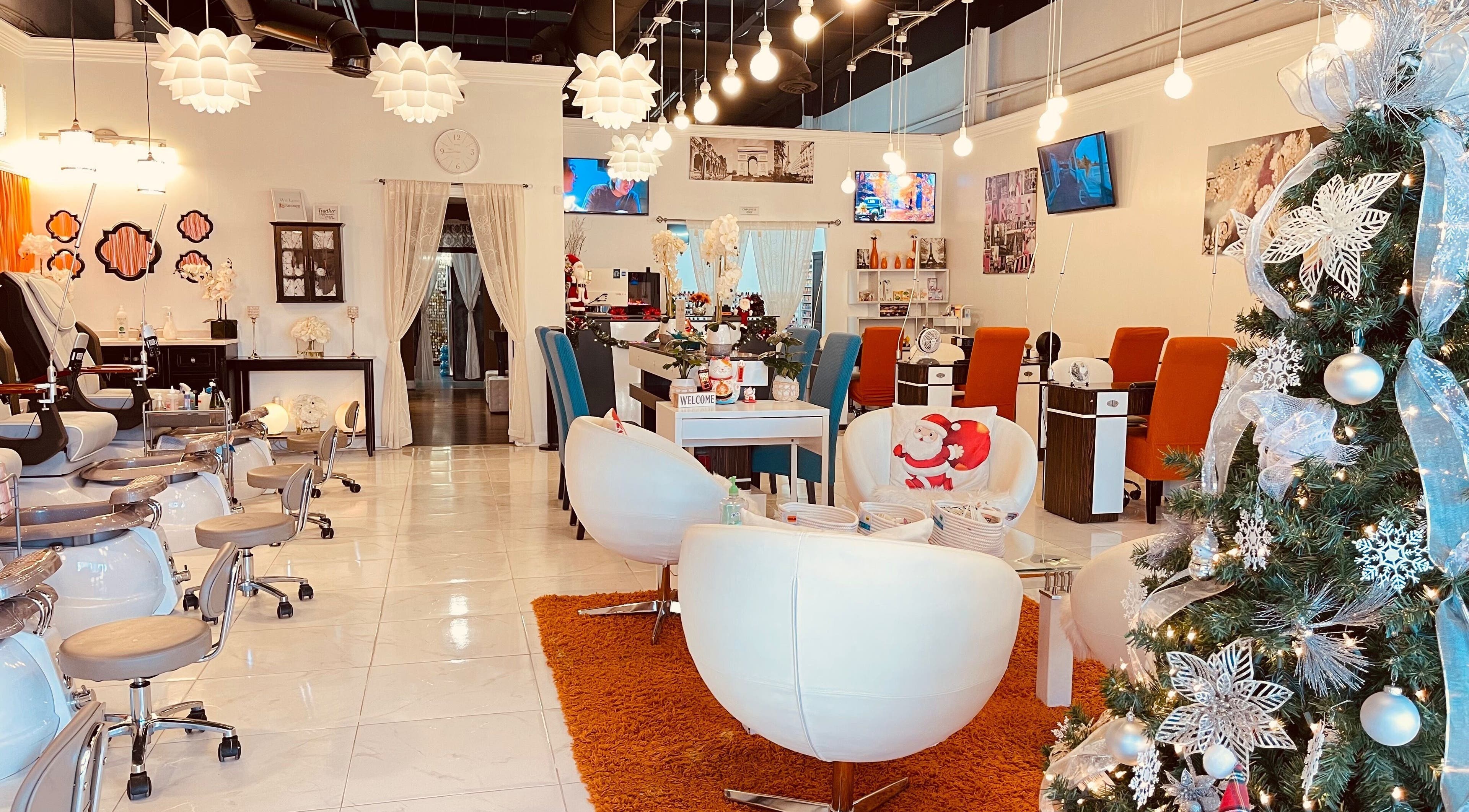 Festive salon interior at Together Nail Parlor, Suwanee, Georgia, US with elegant chairs and decorations.