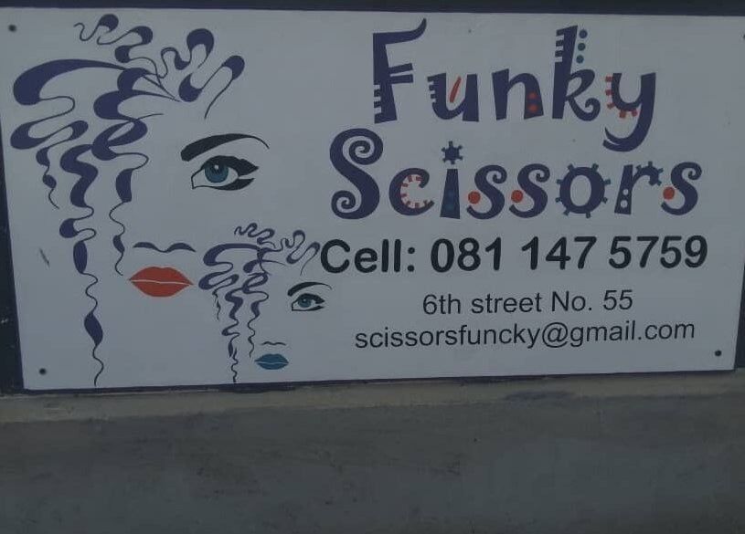 Funky Scissors sign with artistic design in Walvis Bay, Erongo Region, NA.