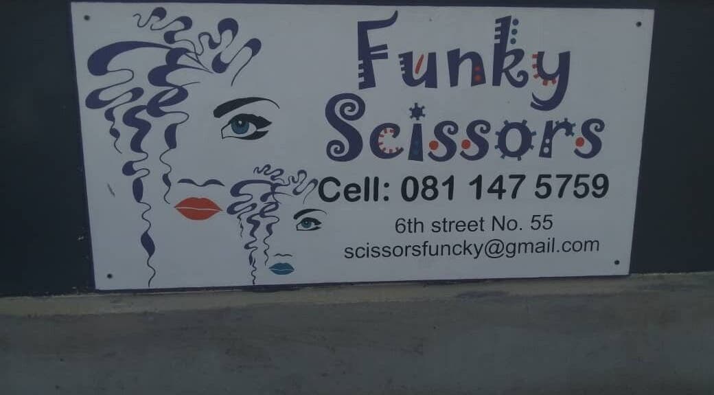 Funky Scissors sign with artistic design in Walvis Bay, Erongo Region, NA.