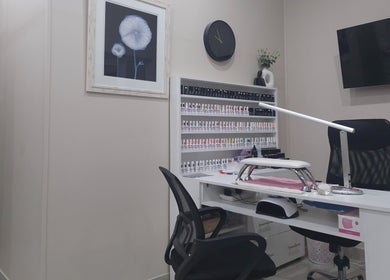 Nail studio at NK Beauty & Aesthetics, Upington, Northern Cape, ZA featuring elegant nail polish display.