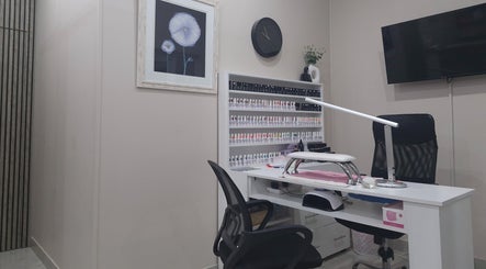 Nail studio at NK Beauty & Aesthetics, Upington, Northern Cape, ZA featuring elegant nail polish display.