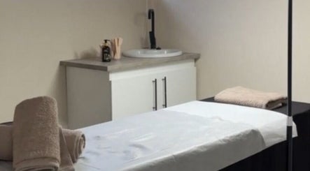 Tranquil treatment room at NK Beauty & Aesthetics, Upington, Northern Cape, ZA, ready for relaxation.