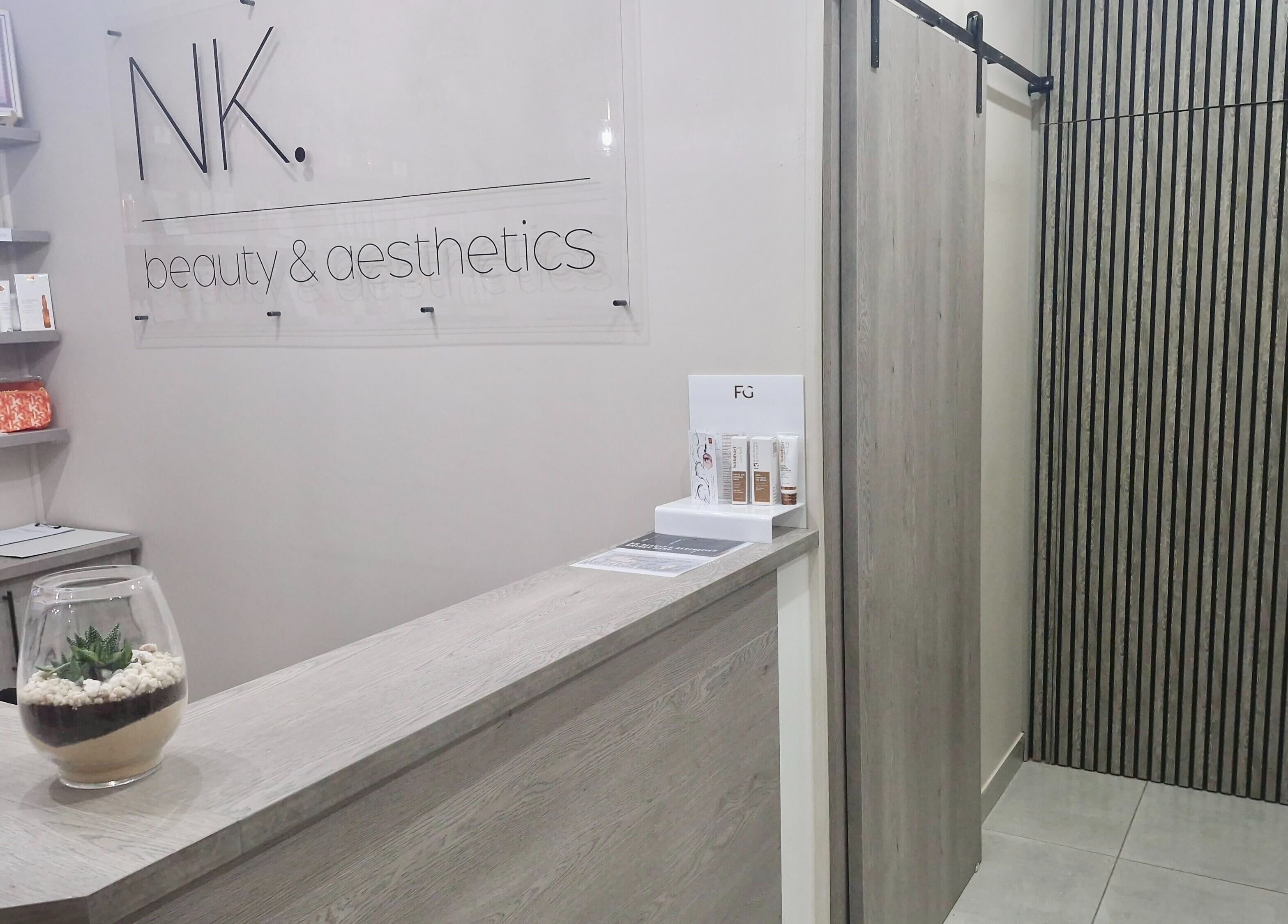 Reception area at NK Beauty & Aesthetics in Upington, Northern Cape, ZA, showcasing a sleek and modern design.