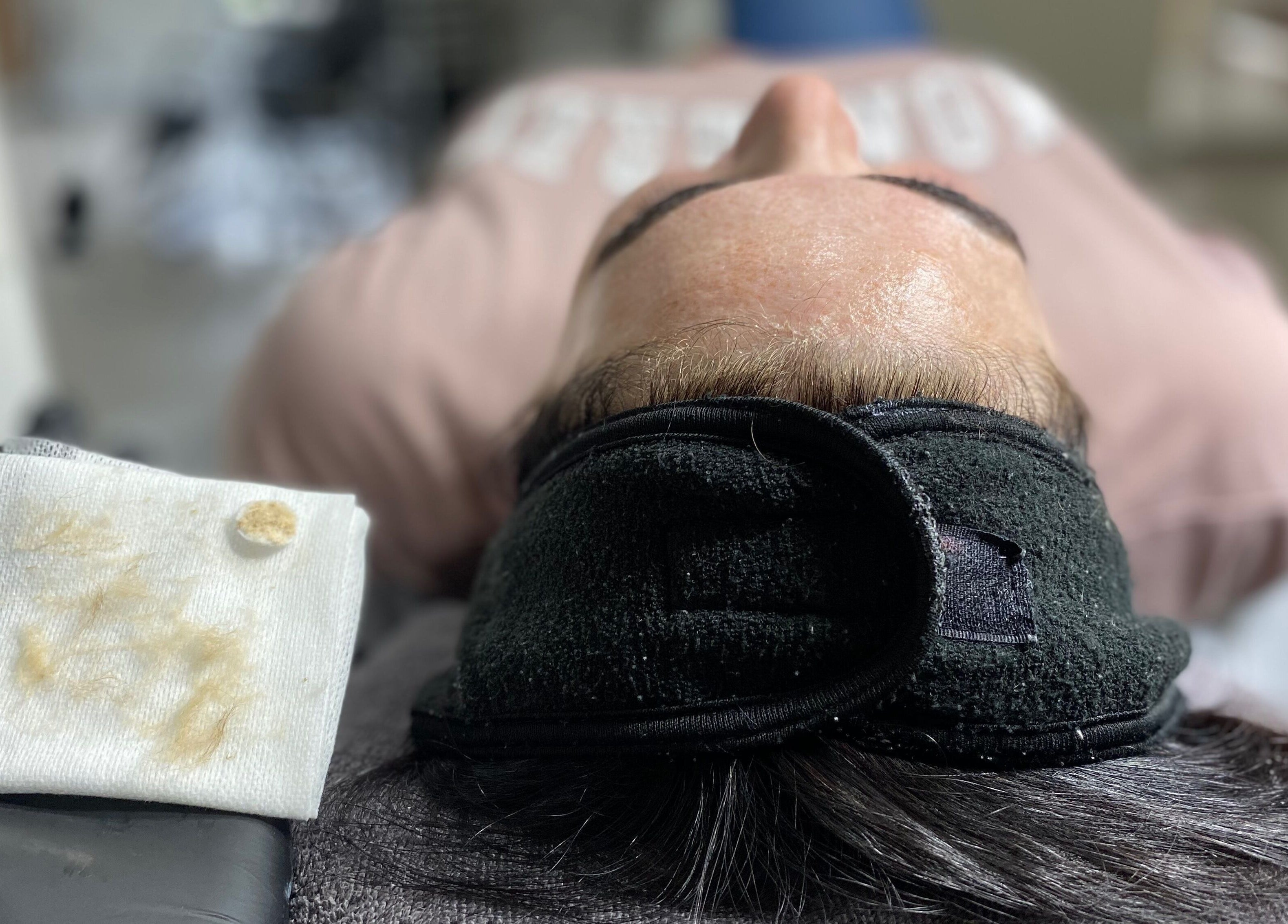 Client at Frankly Beautiful in Emu Heights, New South Wales, AU enjoying a relaxing skincare session.