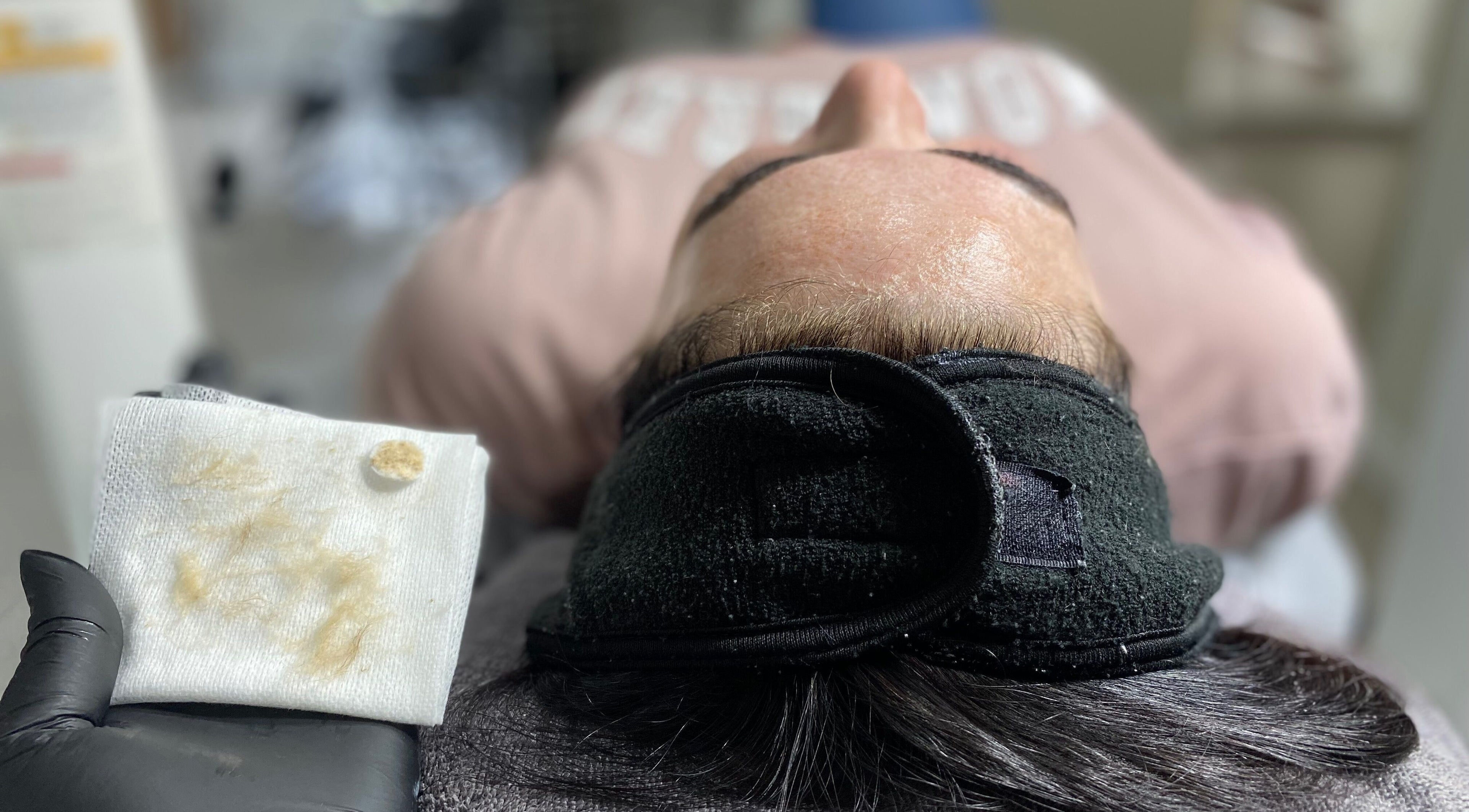 Client at Frankly Beautiful in Emu Heights, New South Wales, AU enjoying a relaxing skincare session.