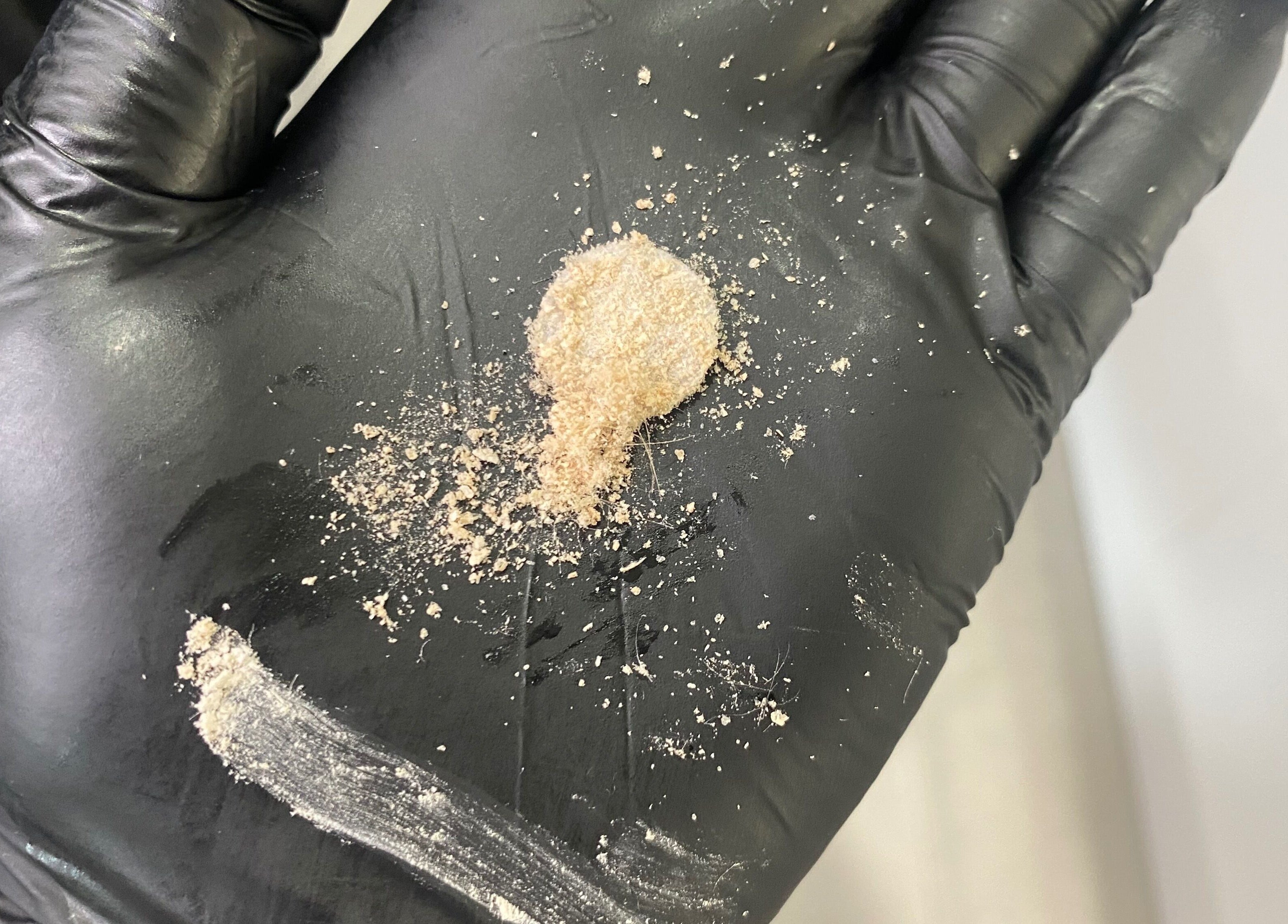 Exfoliating glove with scrub granules at Frankly Beautiful, Emu Heights, New South Wales, AU.