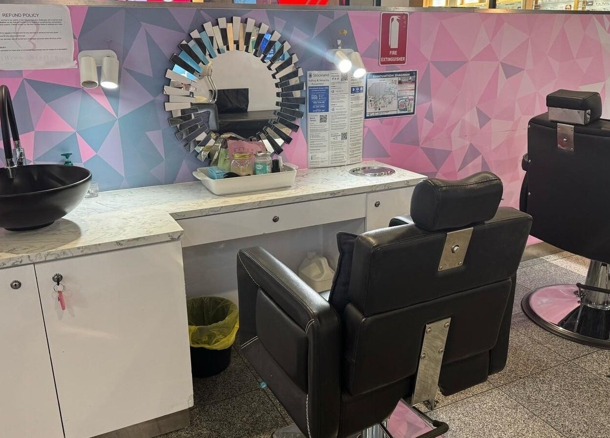 Modern beauty station at iBrow Station Greenhills in East Maitland, NSW, AU with stylish chairs and décor.