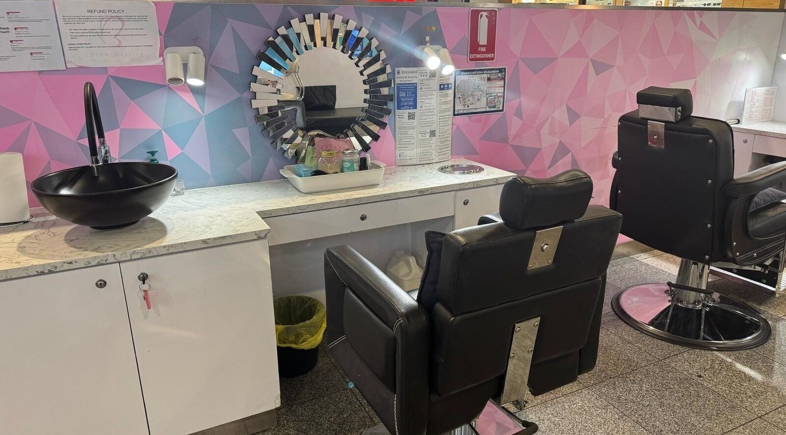 Modern beauty station at iBrow Station Greenhills in East Maitland, NSW, AU with stylish chairs and décor.
