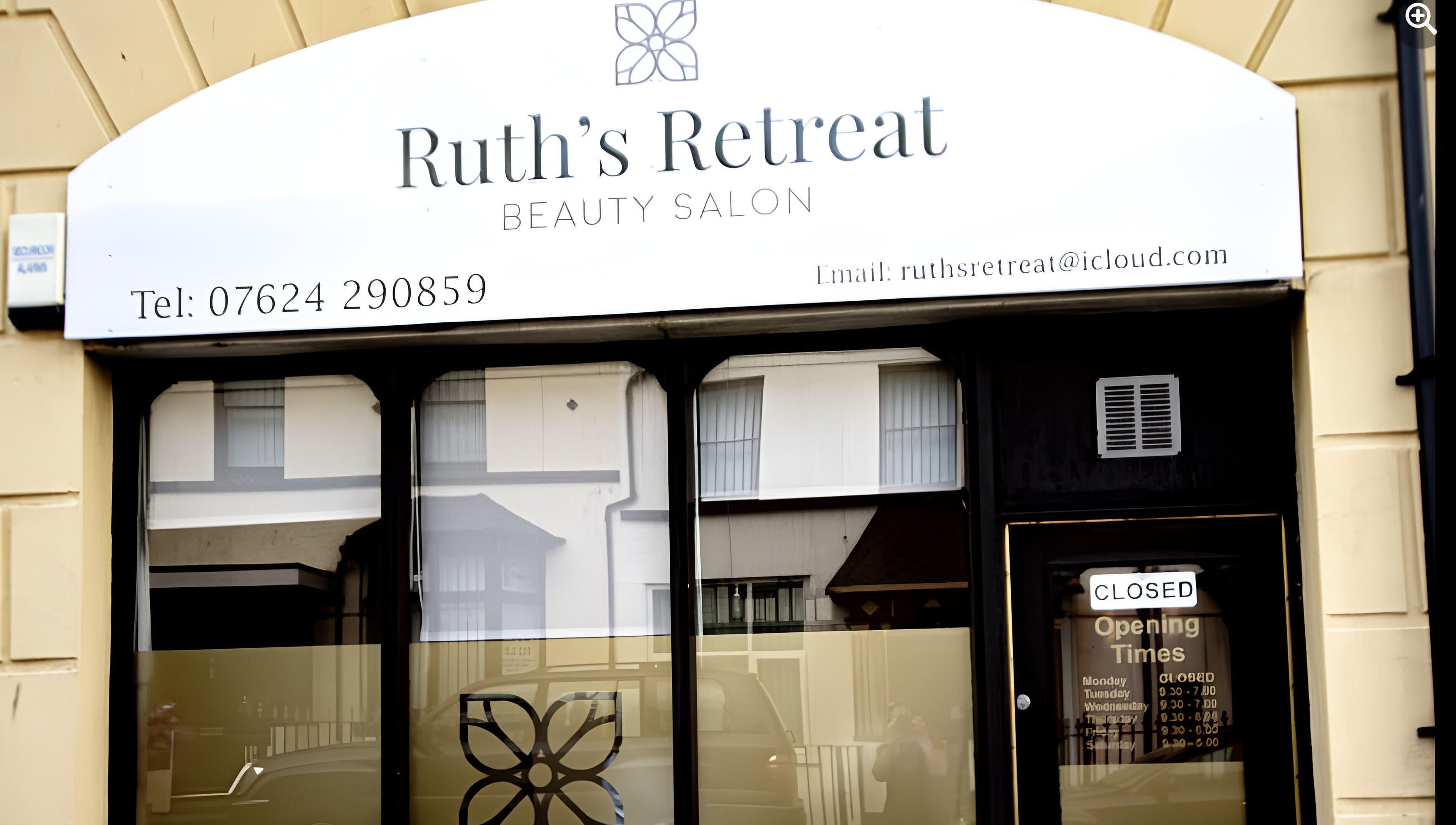 Front entrance of Ruth's Retreat beauty salon in Douglas, GB showcasing its elegant exterior design.
