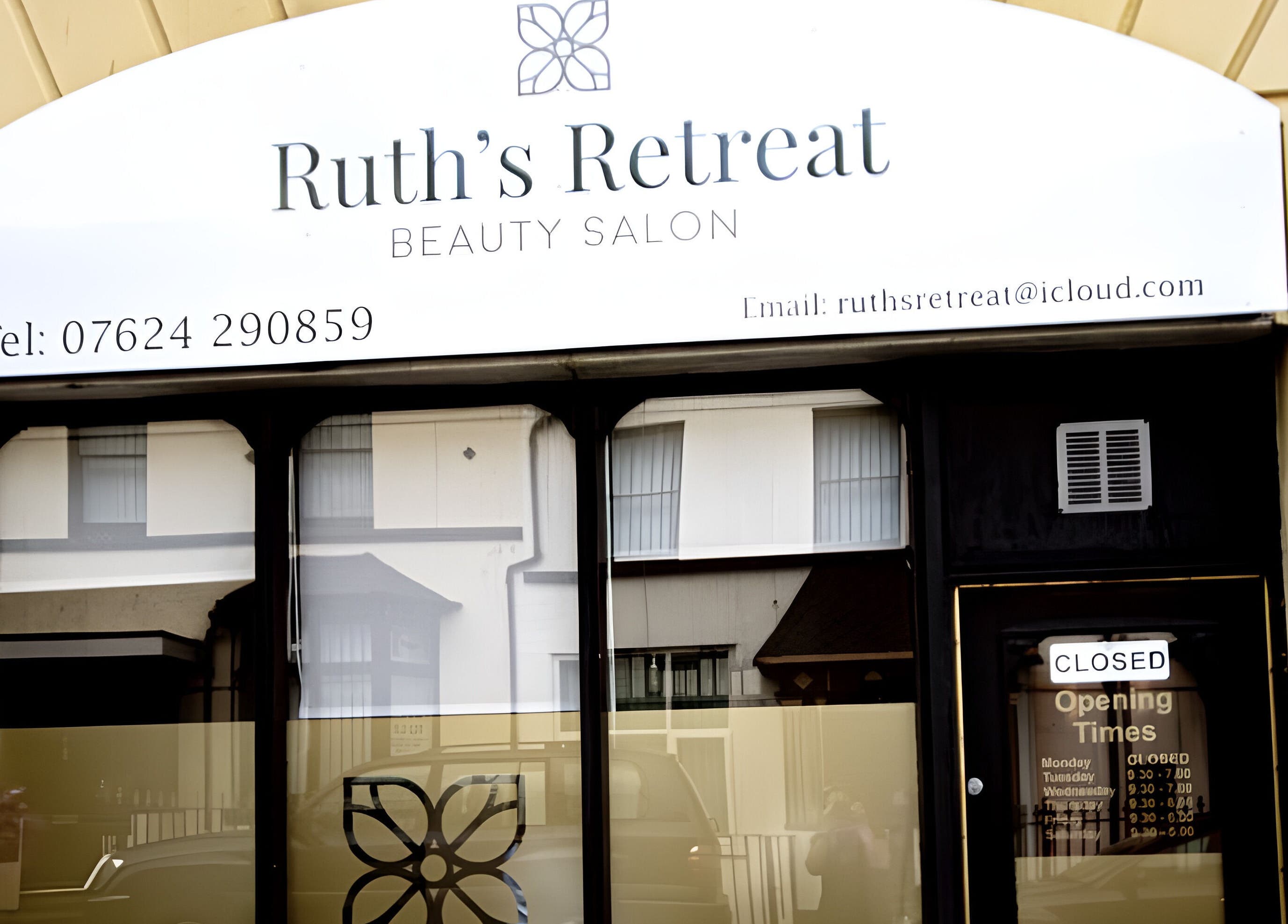 Front entrance of Ruth's Retreat beauty salon in Douglas, GB showcasing its elegant exterior design.