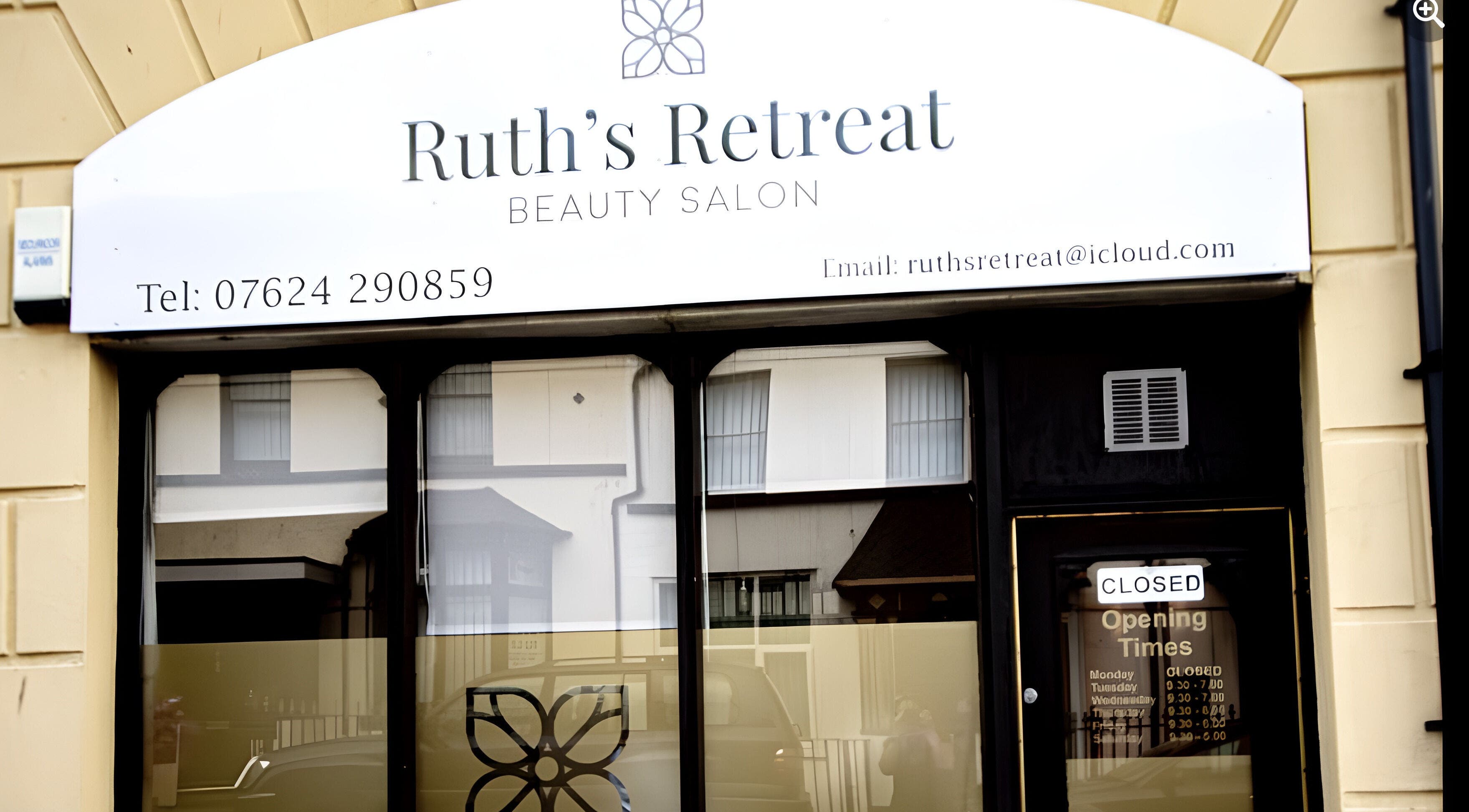 Front entrance of Ruth's Retreat beauty salon in Douglas, GB showcasing its elegant exterior design.