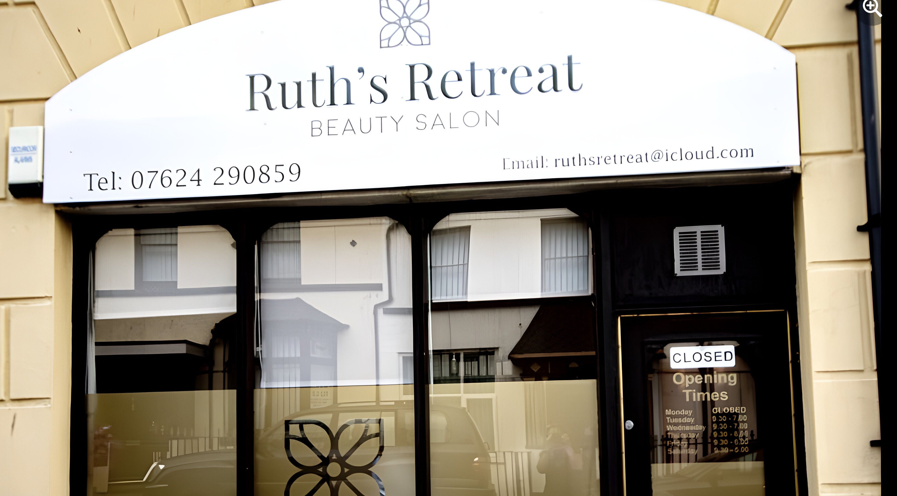 Front entrance of Ruth's Retreat beauty salon in Douglas, GB showcasing its elegant exterior design.