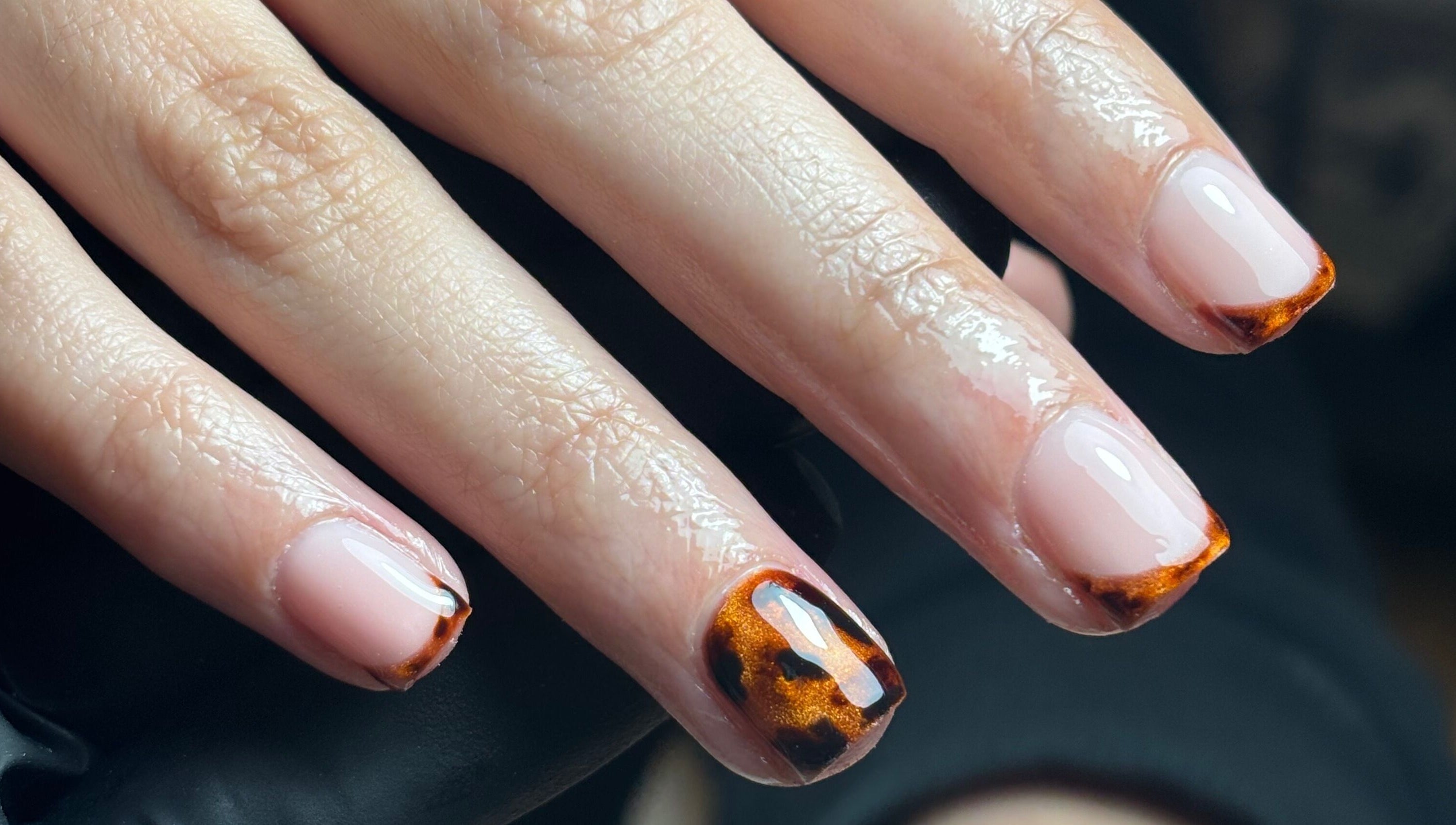 Elegant nail art design at Nails By Cait in Darwen, England, GB, featuring a tortoiseshell pattern on manicured nails.