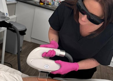 Technician performing laser treatment at El Beaut Beauty and Aesthetics, Huddersfield, England, GB.