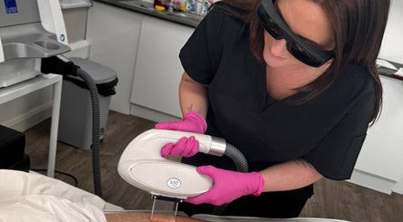 Technician performing laser treatment at El Beaut Beauty and Aesthetics, Huddersfield, England, GB.