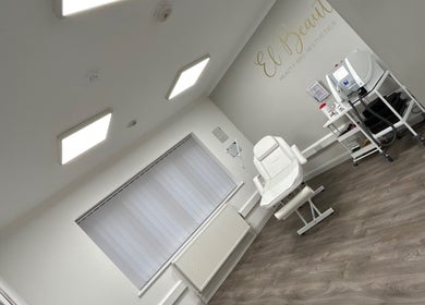 Modern treatment room at El Beaut Beauty and Aesthetics in Huddersfield, England, GB with sleek equipment.