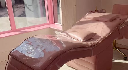 Luxurious pink treatment bed at Goddess Beauty Boutique, Guisborough, England, GB, offering serene wellness.