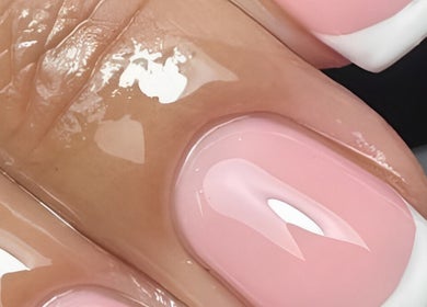 French manicure at Goddess Beauty Boutique, Guisborough, England, GB. Elegant pink nails with glossy finish.