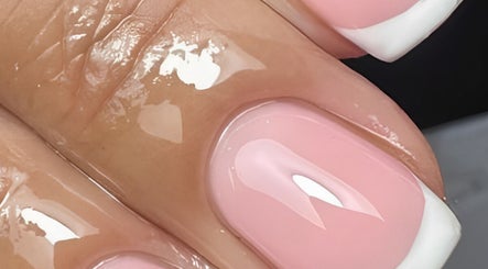 French manicure at Goddess Beauty Boutique, Guisborough, England, GB. Elegant pink nails with glossy finish.