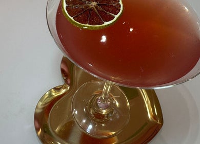 Elegant cocktail with a lime slice at Goddess Beauty Boutique, Guisborough, England, GB
