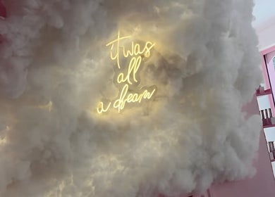 Neon 'It was all a dream' sign in fluffy decor at Goddess Beauty Boutique, Guisborough, England, GB.