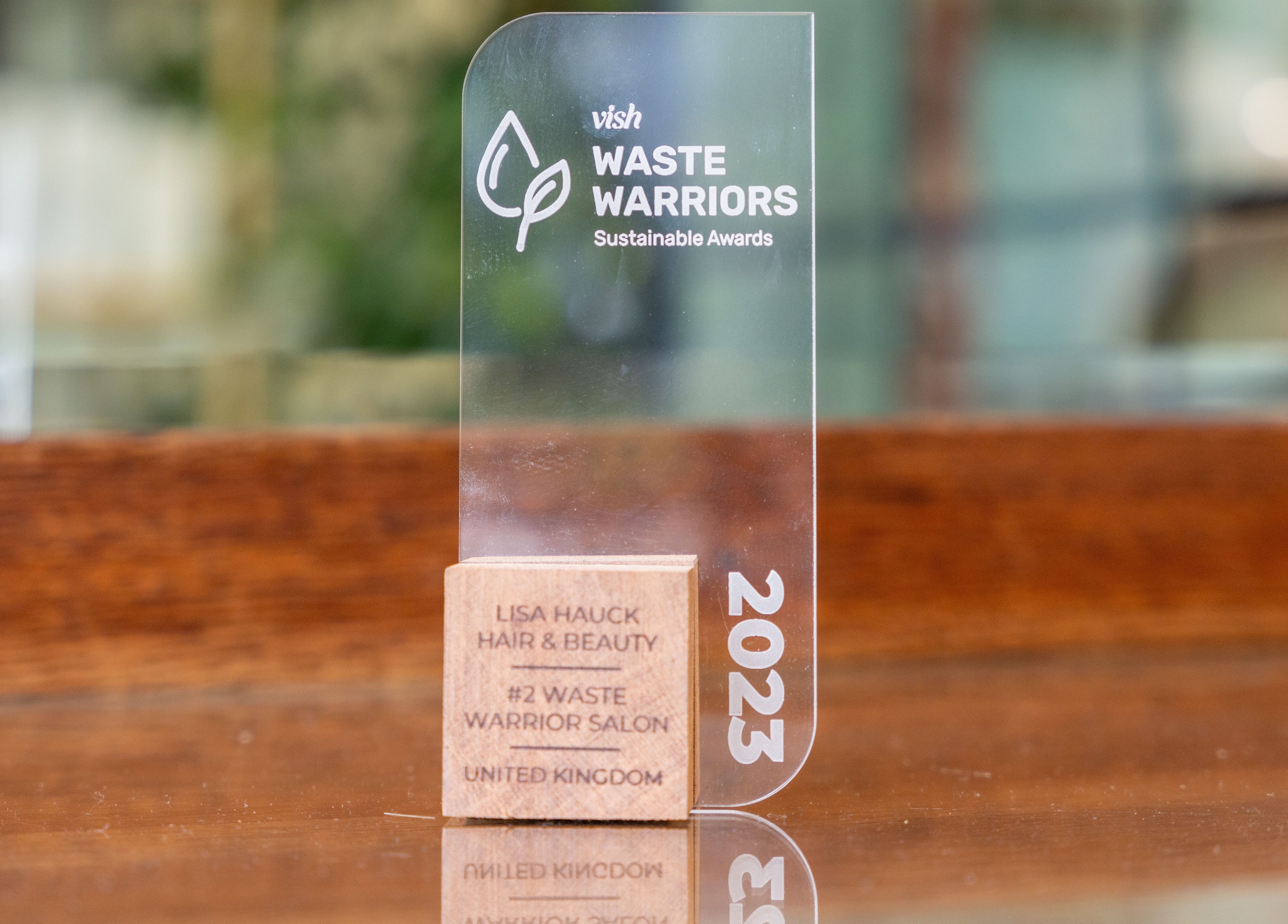 Lisa Hauck's Waste Warriors award displayed in London, England, GB for sustainable beauty practices.
