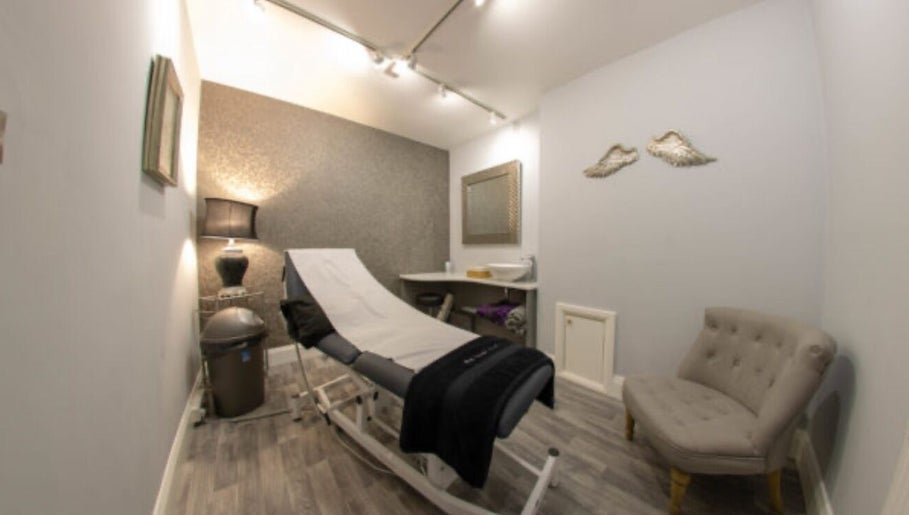 Elegant treatment room at Hannah McCoy Clinic Leeds, featuring a comfortable chair and modern decor, in Leeds, England, GB.